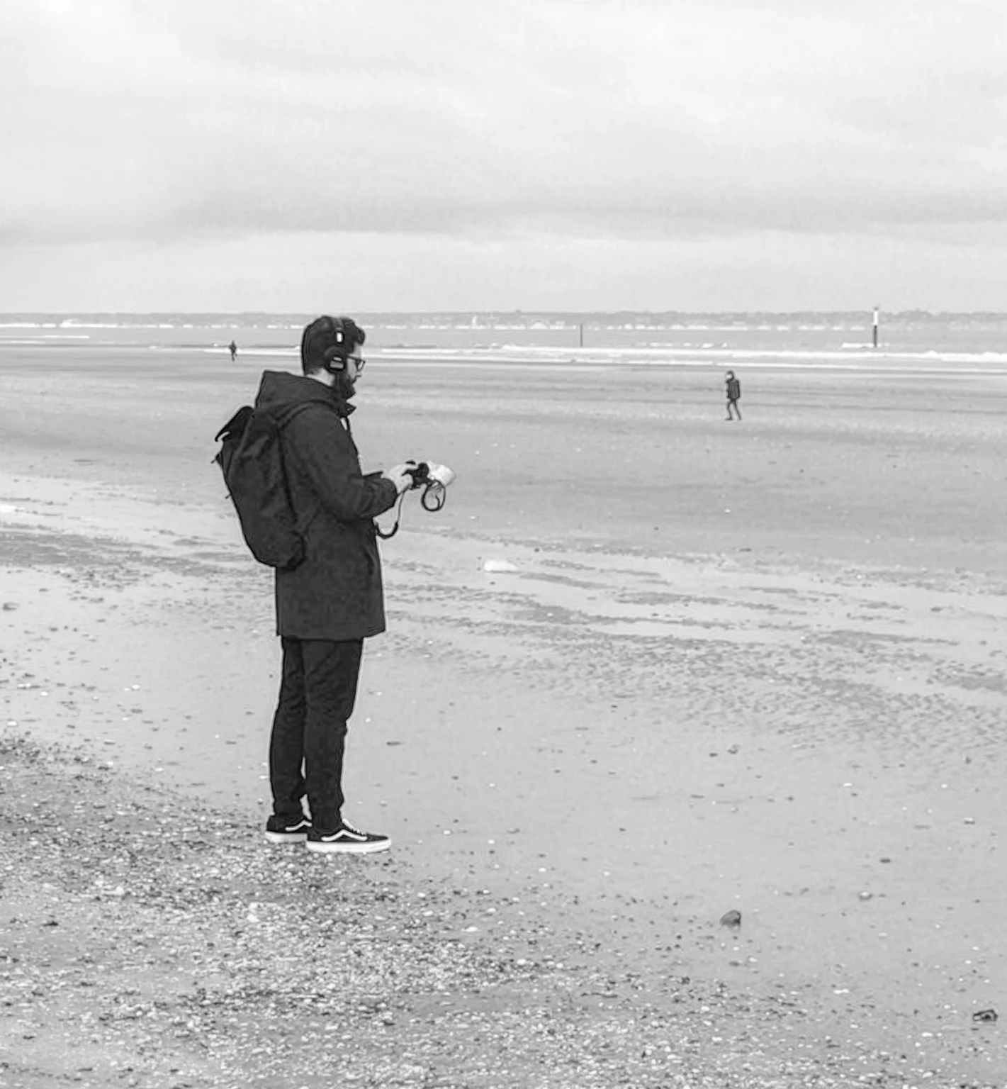 Georges Daou recording sound on a beach
