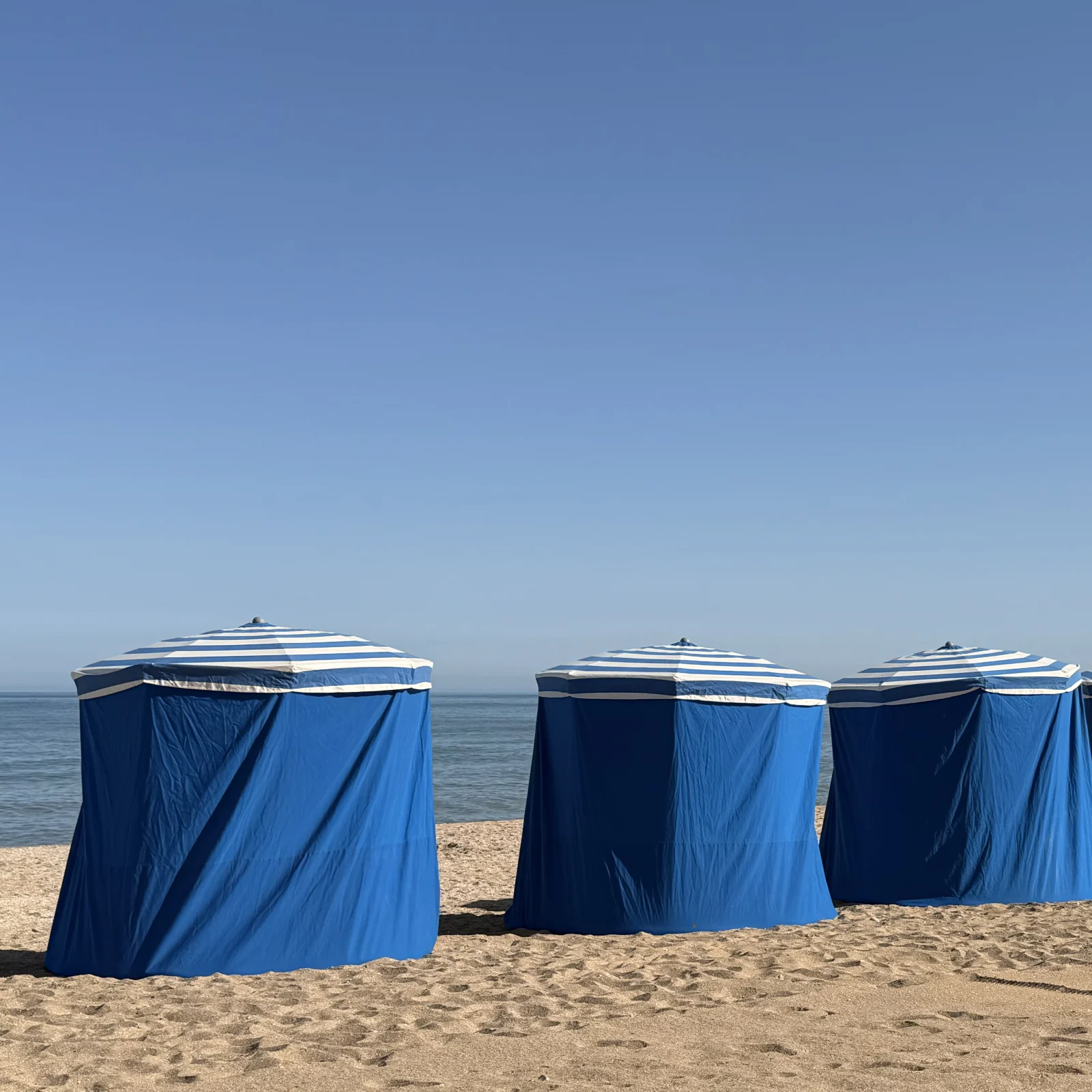 Blue beach cabins in Blonville, Normandy